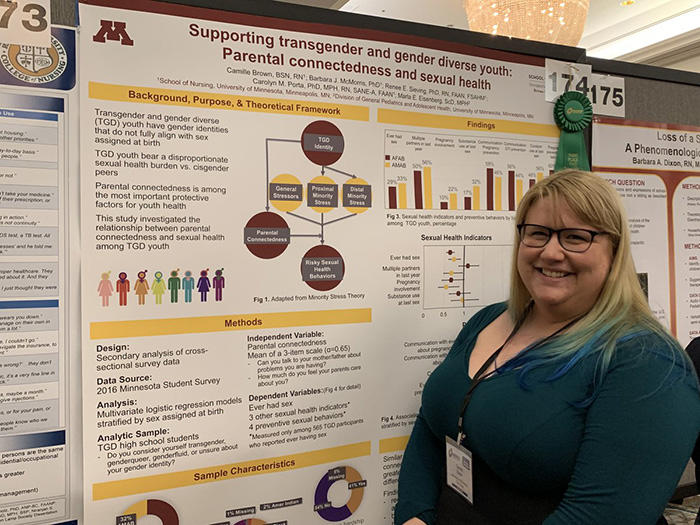 UMN student at her MNRS poster 